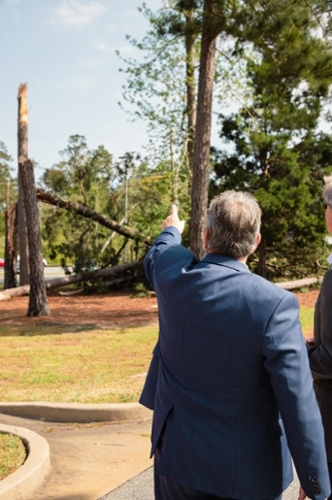President Blake assessing damage to the Cochran Campus on April 7.